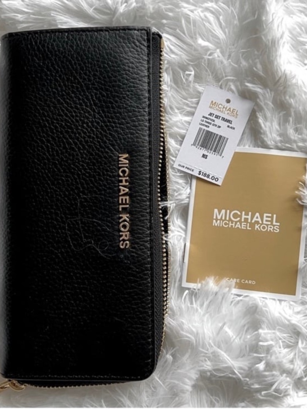Michael Kors Black Zip-Around Pebbled Leather Wallet with Gold Logo